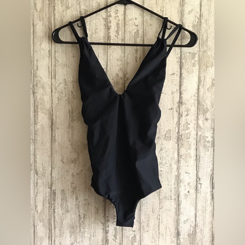 Deep V-neck Tori Praver Bathing Suit